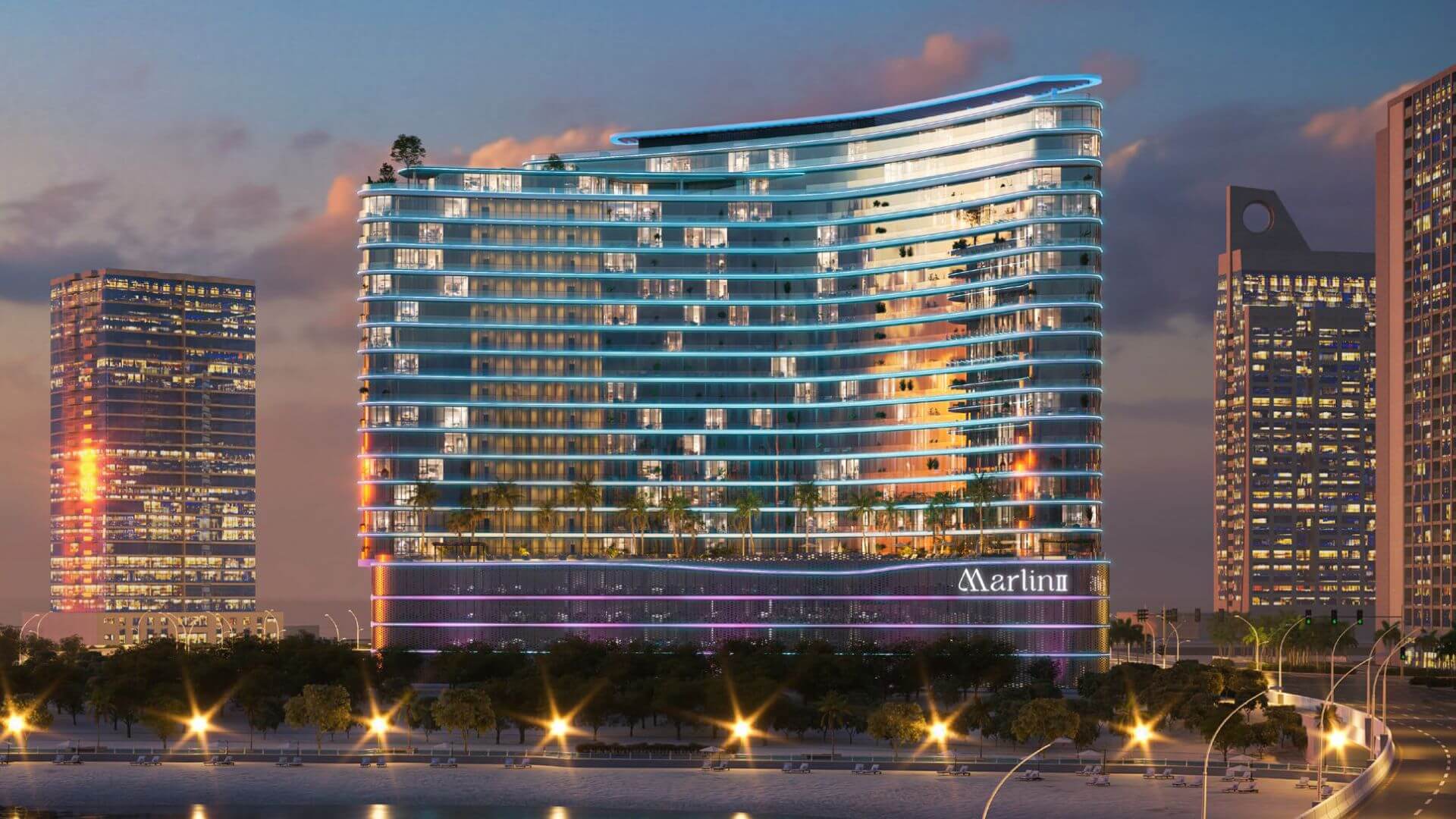 Modern curved skyscraper with blue neon lights at dusk, overlooking a waterfront city skyline.